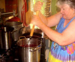 Mashing the boiling fruit