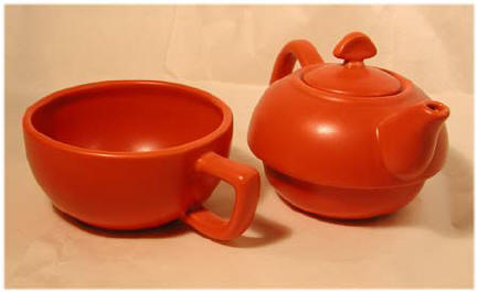 Teapot and matching cup